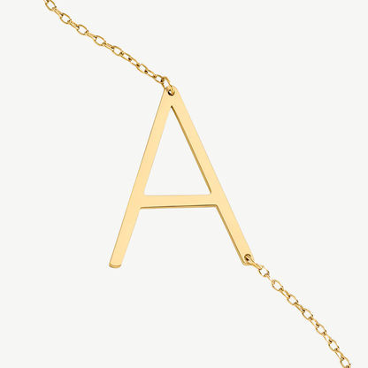 COLLAR INICIAL GRANDE ACERO BAÑO ORO
