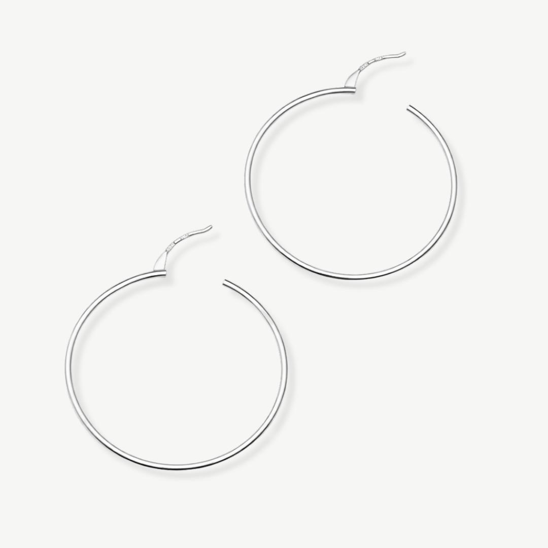 Detalle pendientes aros plata - Tresora Paris